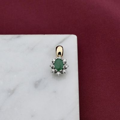 Image 2 of Two-tone gold pendant with emerald and diamond | 0.16 ct.