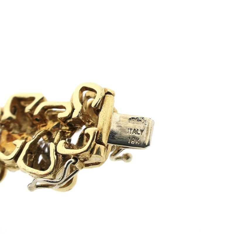 Image 7 of Two-tone gold fantasy bracelet with 0.525 ct diamond.