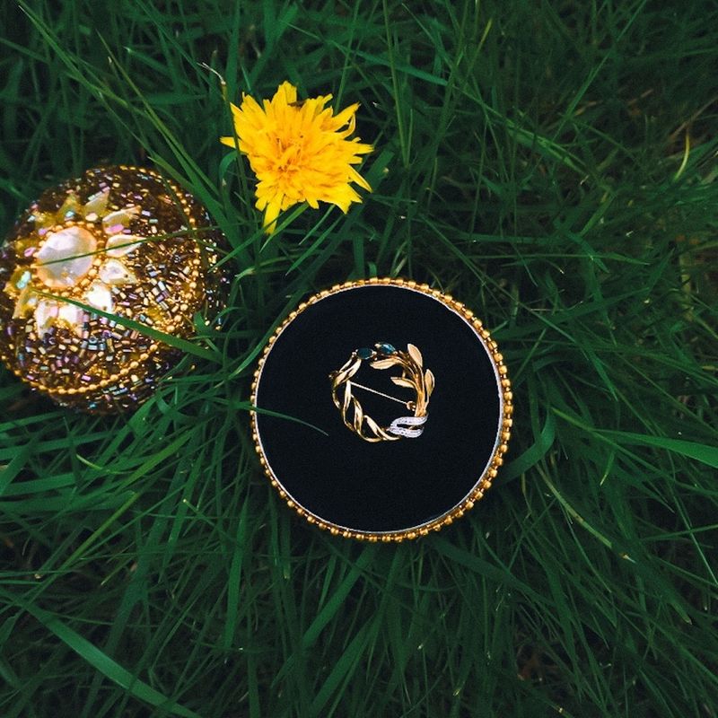 Image 2 of floral brooch with sapphire