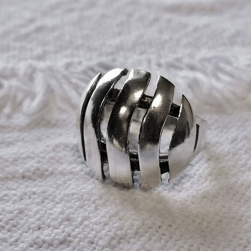 Image 4 of Silver ring with a wavy design.