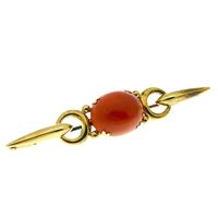Antique gold brooch with blood coral