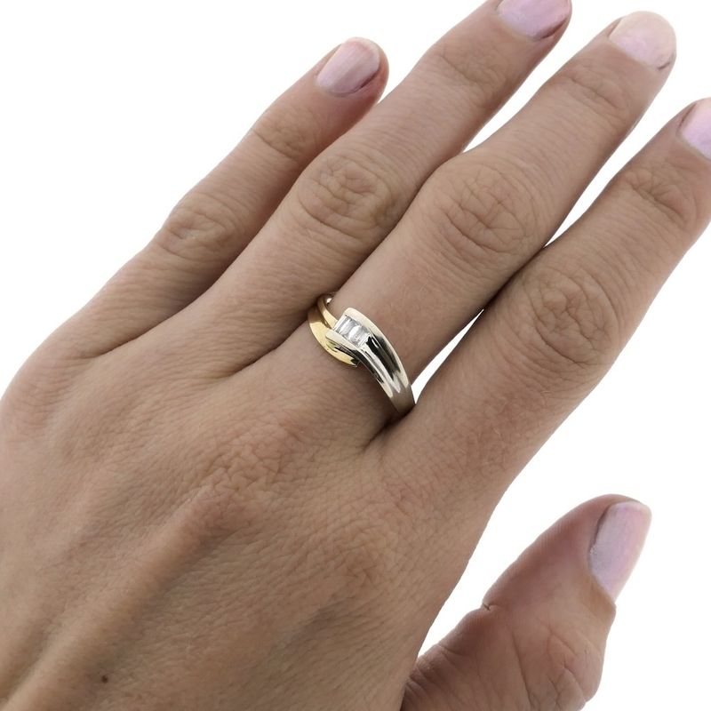 Image 6 of Two-tone gold ring with baguette diamond; 0.21 ct.