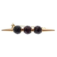 Antique gold brooch with garnet