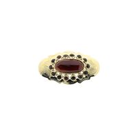Vintage gold brooch with garnet