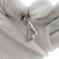 Silver pendant of a cowboy boot