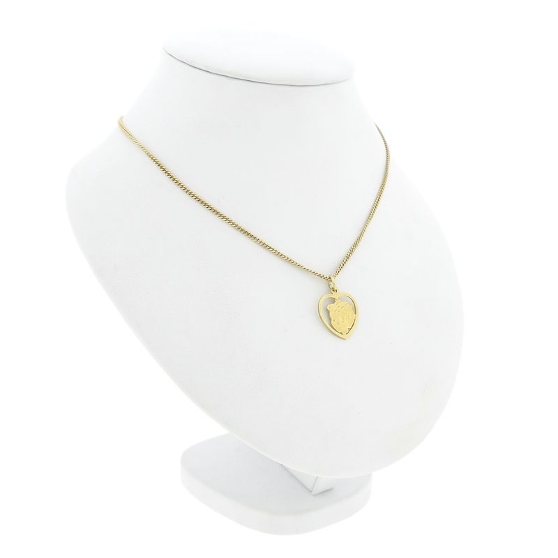 Image 4 of Gold pendant of a heart with a boy's head