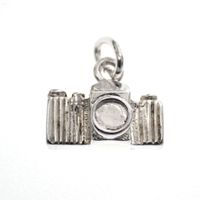 Silver charm; Camera