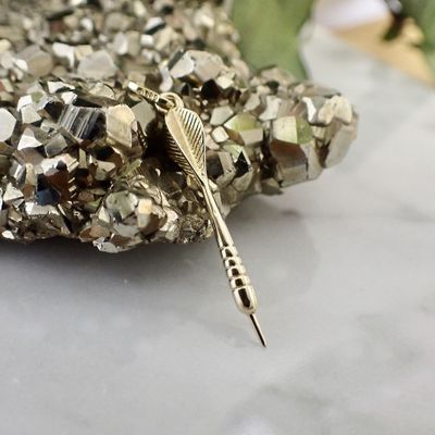 Image 2 of Gold charm of a dart