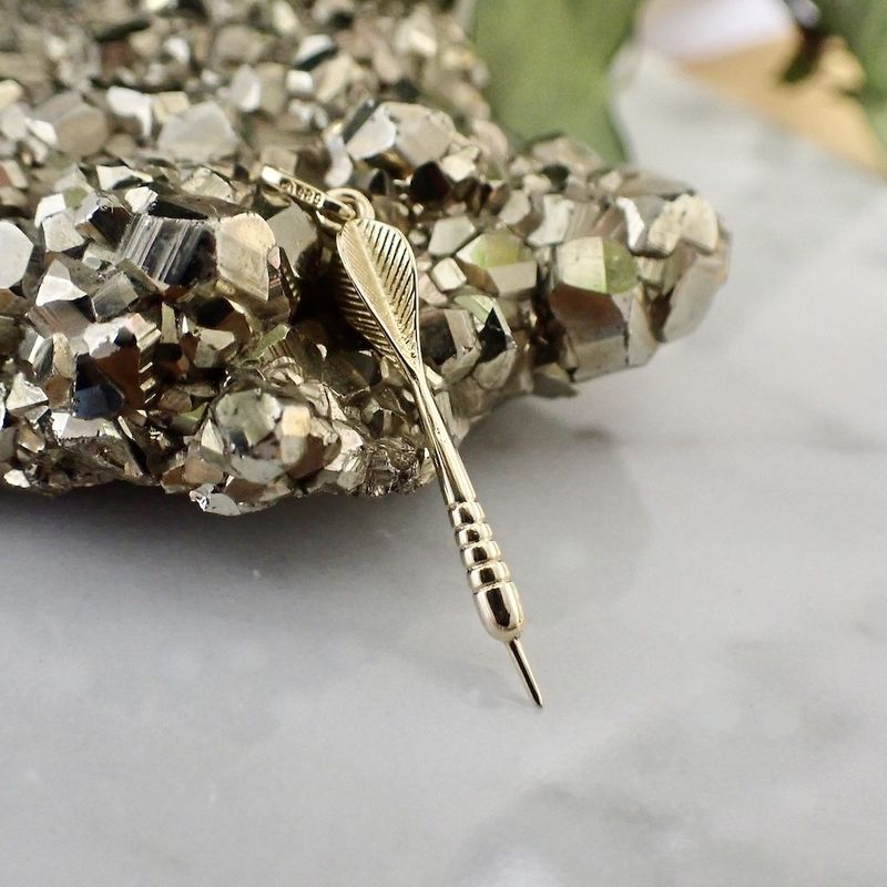Image 2 of Gold charm of a dart