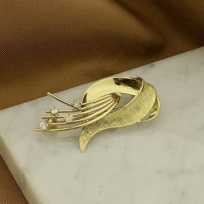 Image 2 of Gold abstract brooch with glass crystal