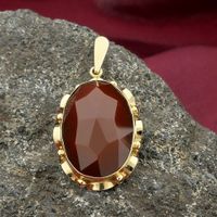 Vintage gold pendant with carnelian