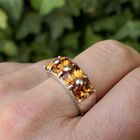 Image 11 of Biba silver ring with orange zirconia stones.