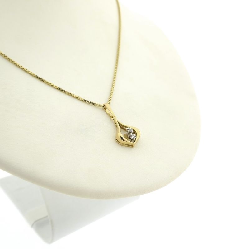 Image 9 of 18K Gold subtle pendant with diamond | 0.02 ct.
