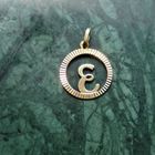 Image 2 of Gold pendant of the letter E