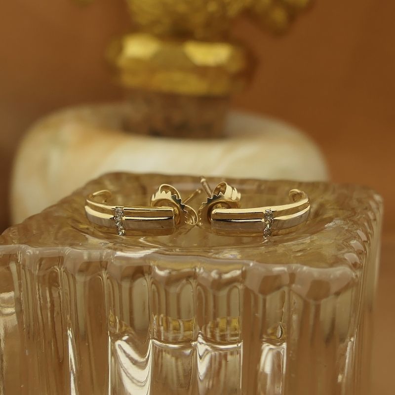 Image 14 of Bicolor gold stud earrings with zirconia