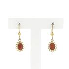 Image 1 of Gold earrings with red coral