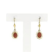 Gold earrings with red coral