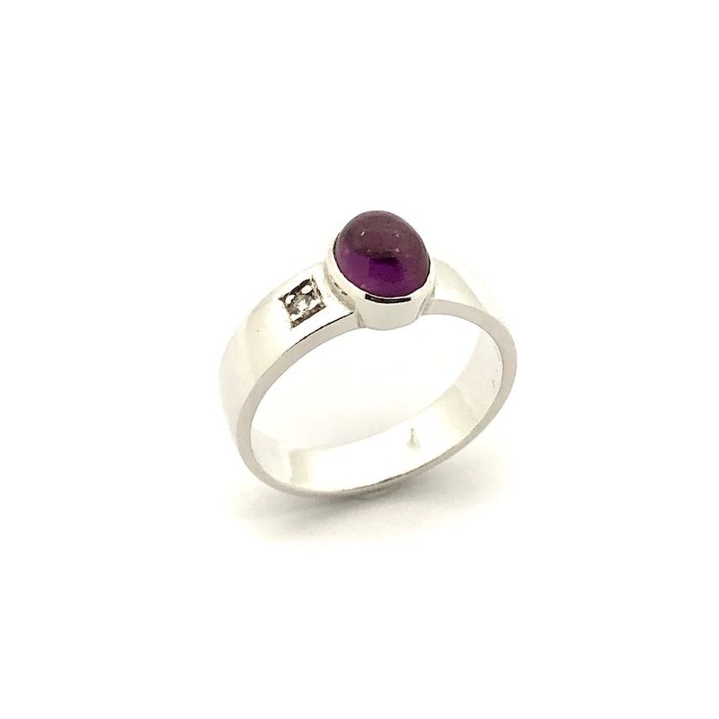 Image 1 of Silver solitaire ring with an oval cut amethyst stone