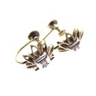 Image 4 of Two-tone gold vintage clip-on earrings with a floral design | 0.06 ct diamond.