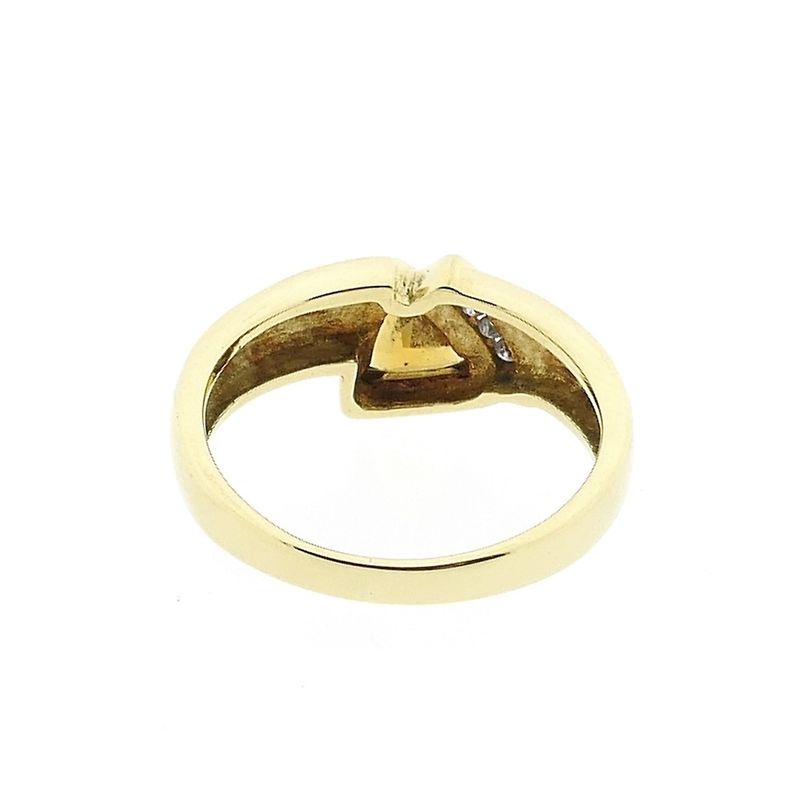 Image 1 of Gold solitaire ring with citrine and diamond; 0.04 ct.