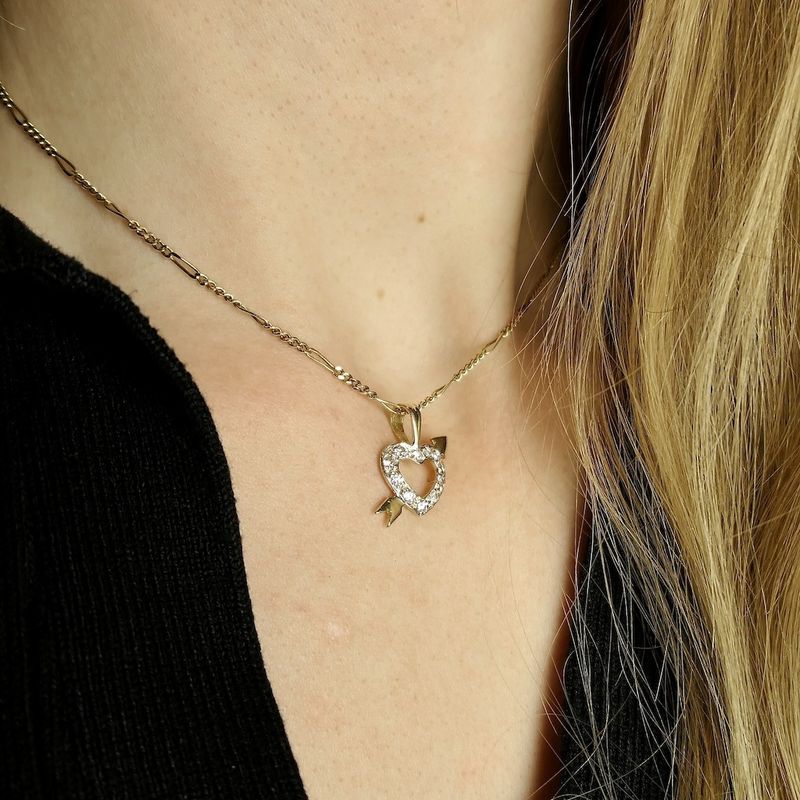 Image 3 of Gold pendant of a heart with arrow