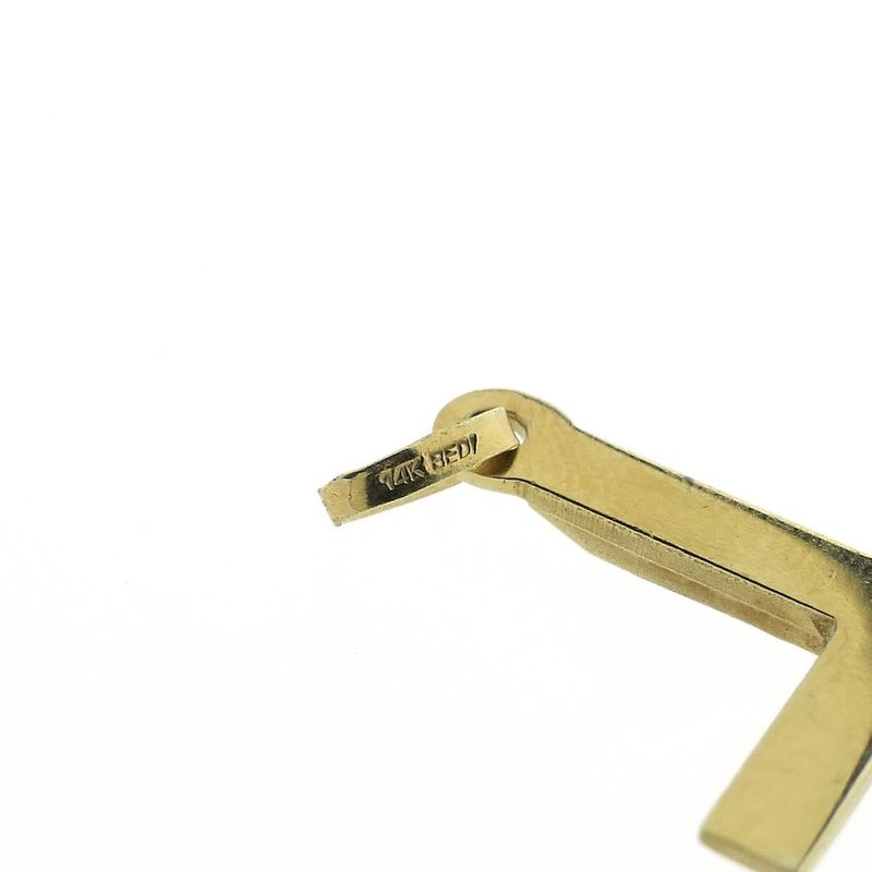 Image 5 of Gold pendant of a cross with facets