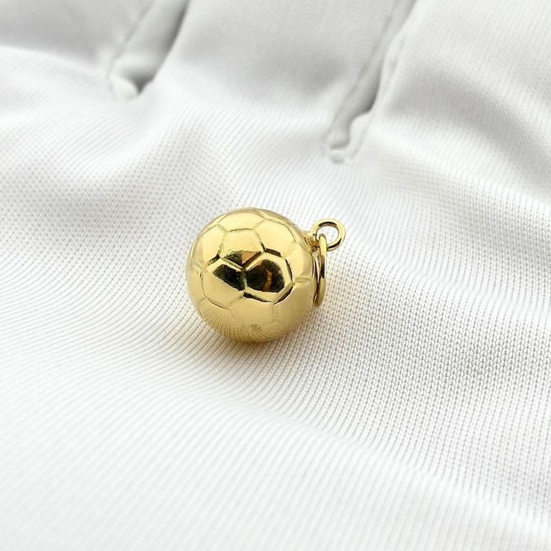 Image 9 of Gold pendant of a football
