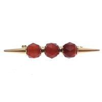 Vintage gold brooch with carnelian