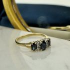 Image 7 of Gold ring with sapphire and diamond | 0.03 ct.