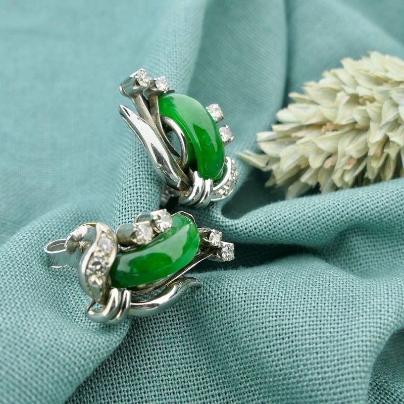 Image 2 of White gold stud earrings with jade and diamond; 0.38 ct.