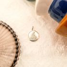 Image 7 of Silver pendant of a man on a racing bike