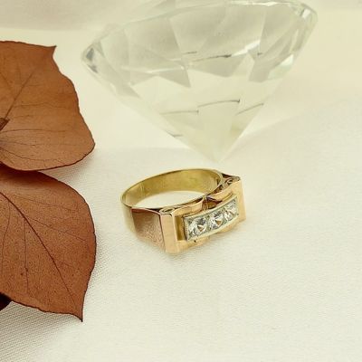 Image 2 of Two-tone gold ring with zirconia.