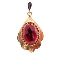 Vintage gold pendant with oval cut garnet