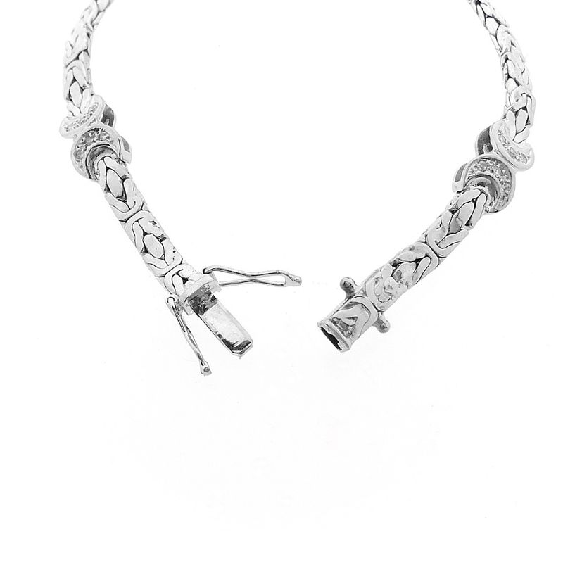 Image 6 of White gold flat king bracelet with fixed charms and 0.24 ct diamond.