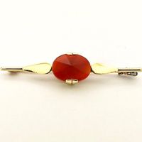 Antique gold brooch with carnelian