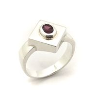 Silver ring with an oval cut amethyst stone