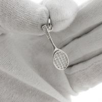Silver pendant of a tennis racket
