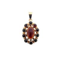 Vintage gold pendant with garnet stones