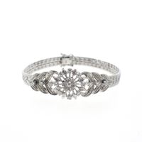 White gold herringbone link bracelet with 0.525 ct diamonds.