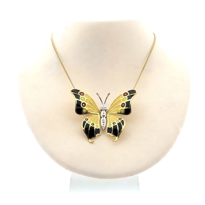 Image 9 of Two-tone gold brooch/pendant of a butterfly with enamel and diamond; 0.04 ct.