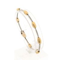Bicolor gold bracelet set with diamonds; 0.16 ct.