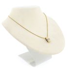 Image 7 of Two-tone gold pendant with diamond; 0.10 ct.