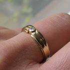 Image 10 of Gold solitaire ring with diamond; 0.04 ct.