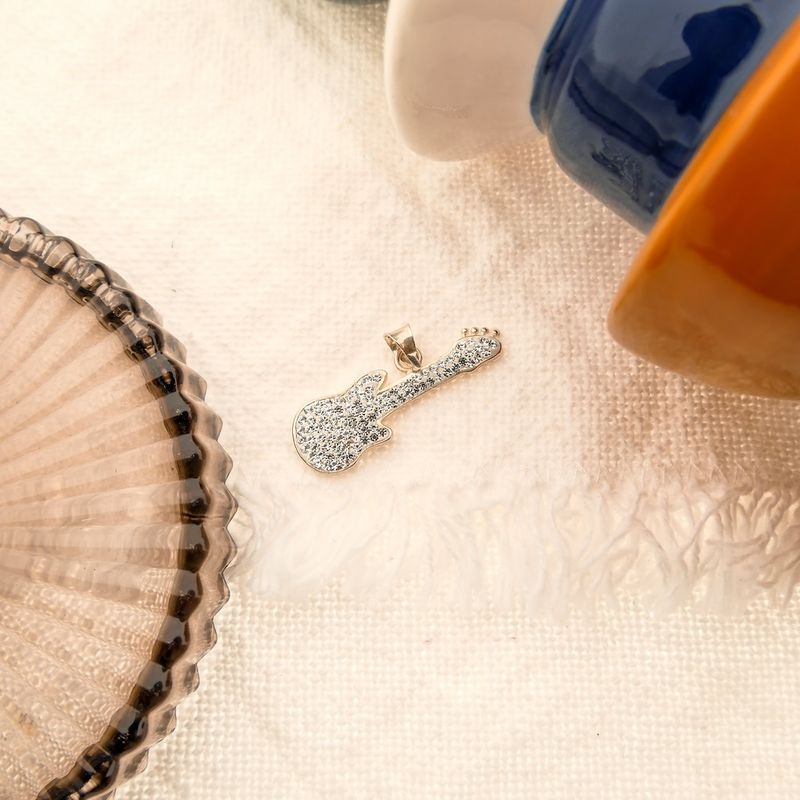 Image 7 of Silver pendant of a guitar with zirconia