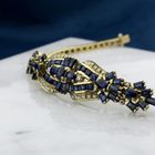 Image 2 of Golden Omega Link Bracelet with Sapphires and Diamonds; 0.30 ct.