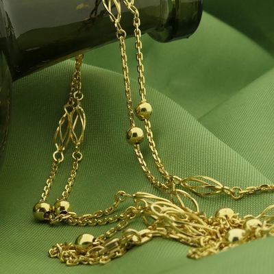 Image 2 of Gold long necklace with decorative details | 90 cm