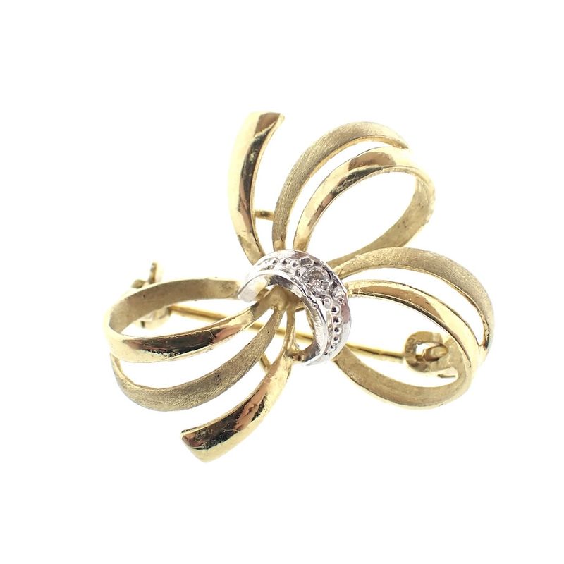 Image 1 of Gold brooch as a bow with diamond