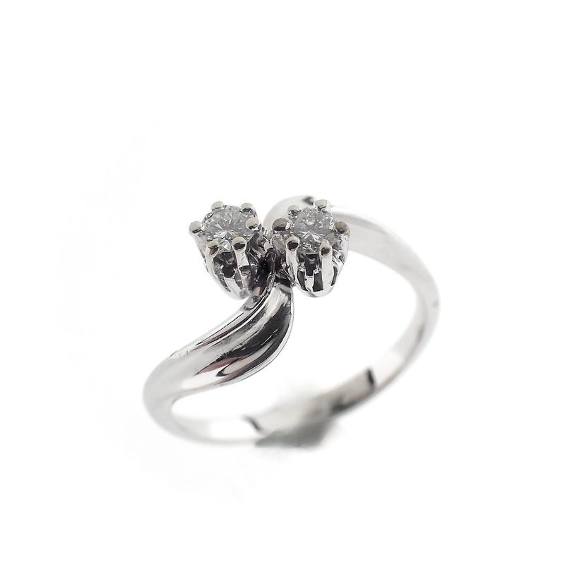 Image 1 of 18 carat white gold ring with 0.20 ct. diamonds.