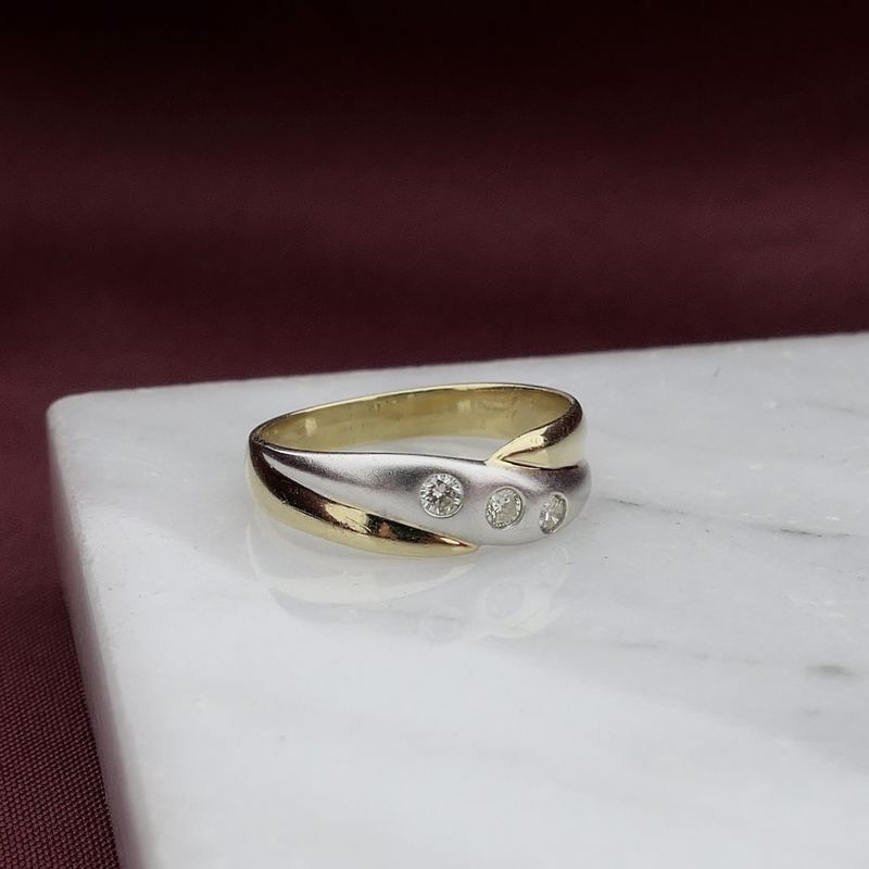 Image 7 of Two-tone gold ring with diamond; 0.15 ct.