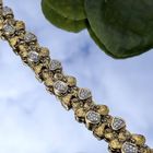 Image 12 of Two-tone gold fantasy bracelet with 0.525 ct diamond.